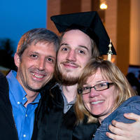 Parents with their student at graduation
